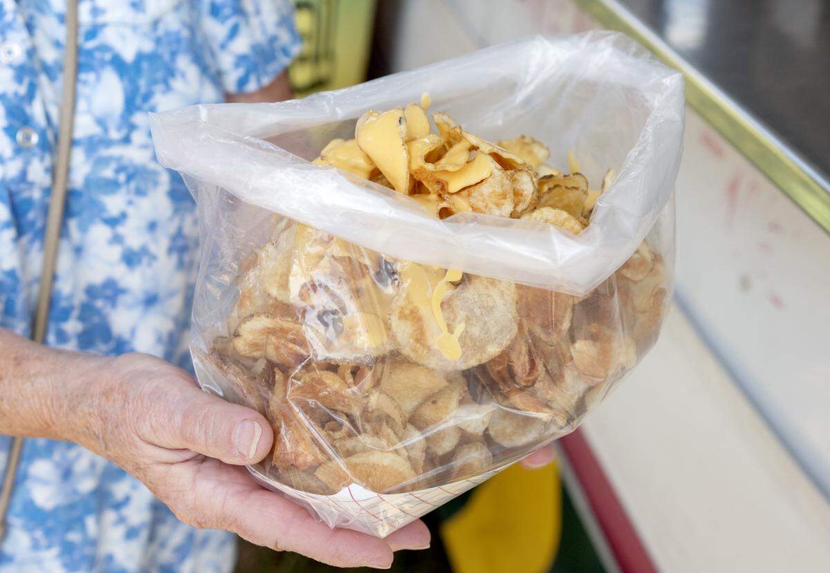 An order of cactus taters with cheese sauce at the Centre County Grange Fair on Friday, Aug. 15, 2025.