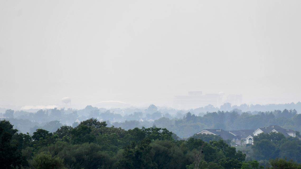 Haze makes it hard to see Beaver Stadium and the Bryce Jordan Center from Harvest Fields on Tuesday.