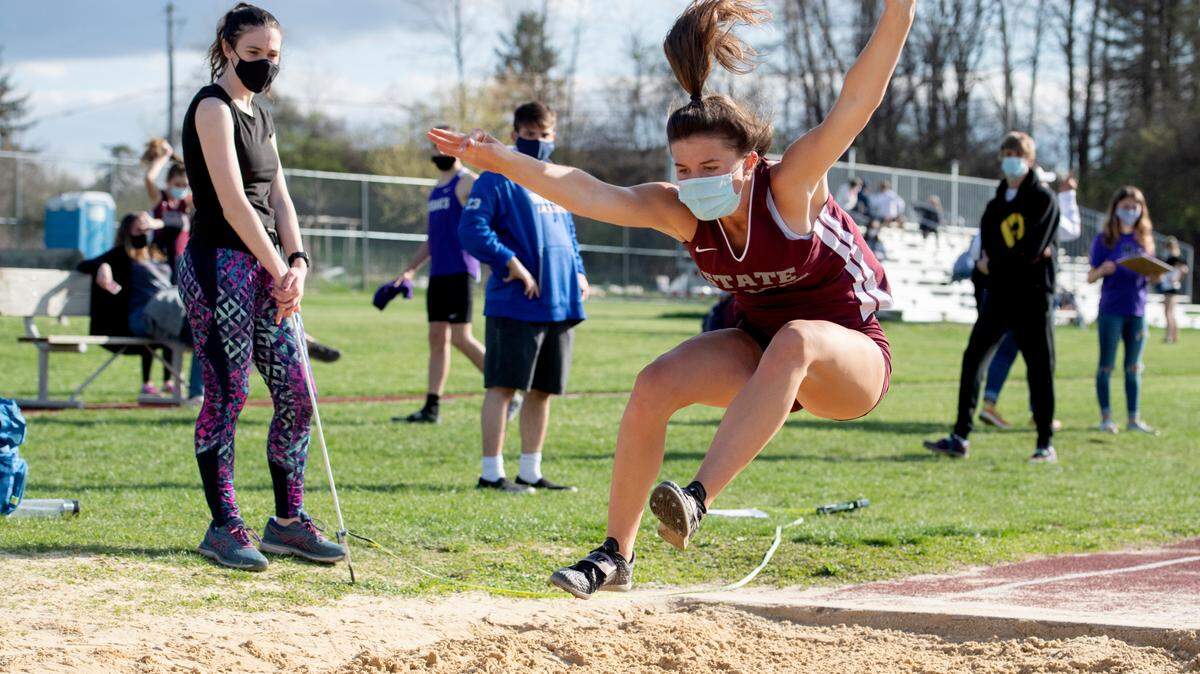 State College’s Shannon Mullin competes in the long jump during the track meet against Mifflin County on Tuesday, April 13, 2021. Mullin took first with a jump of 17-08.50.