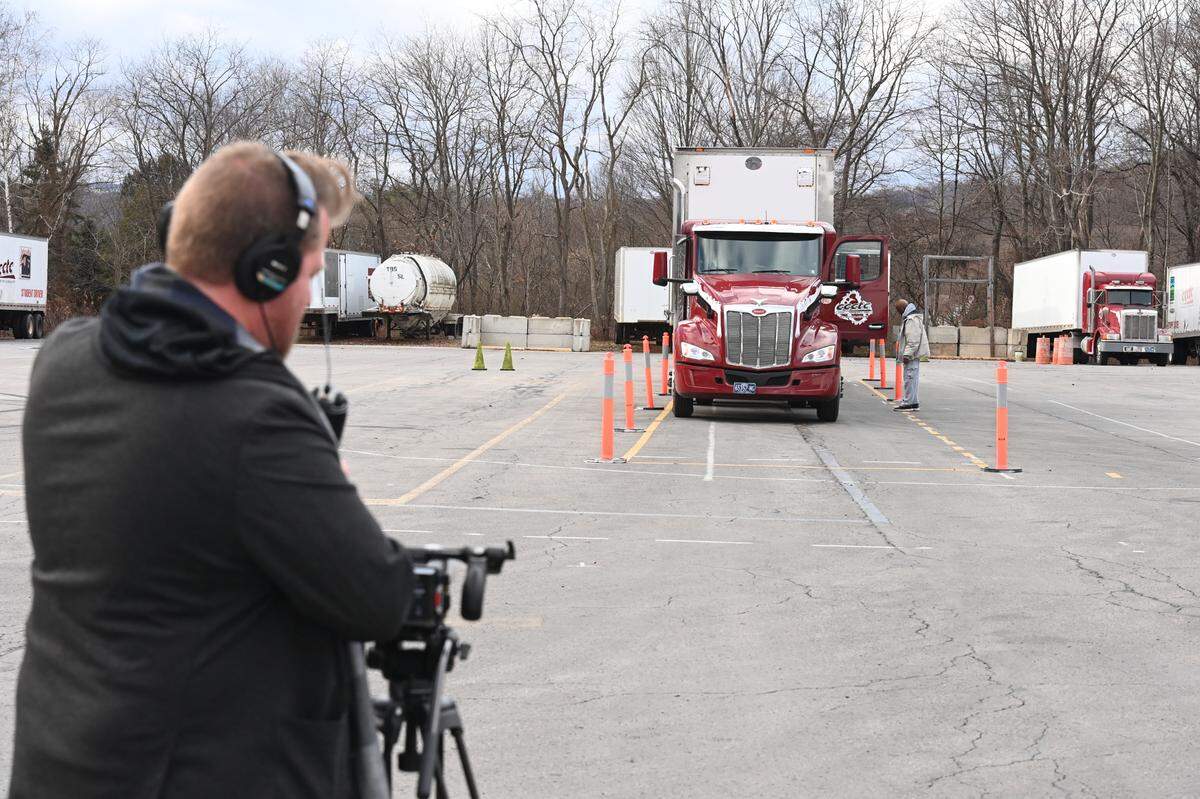 Spencer Folmar records Allen Smith at his job as a CDL instructor at Clearfield County Career and Technology Center as part of the documentary “Sad Santa & the Healing Power of Giving.”