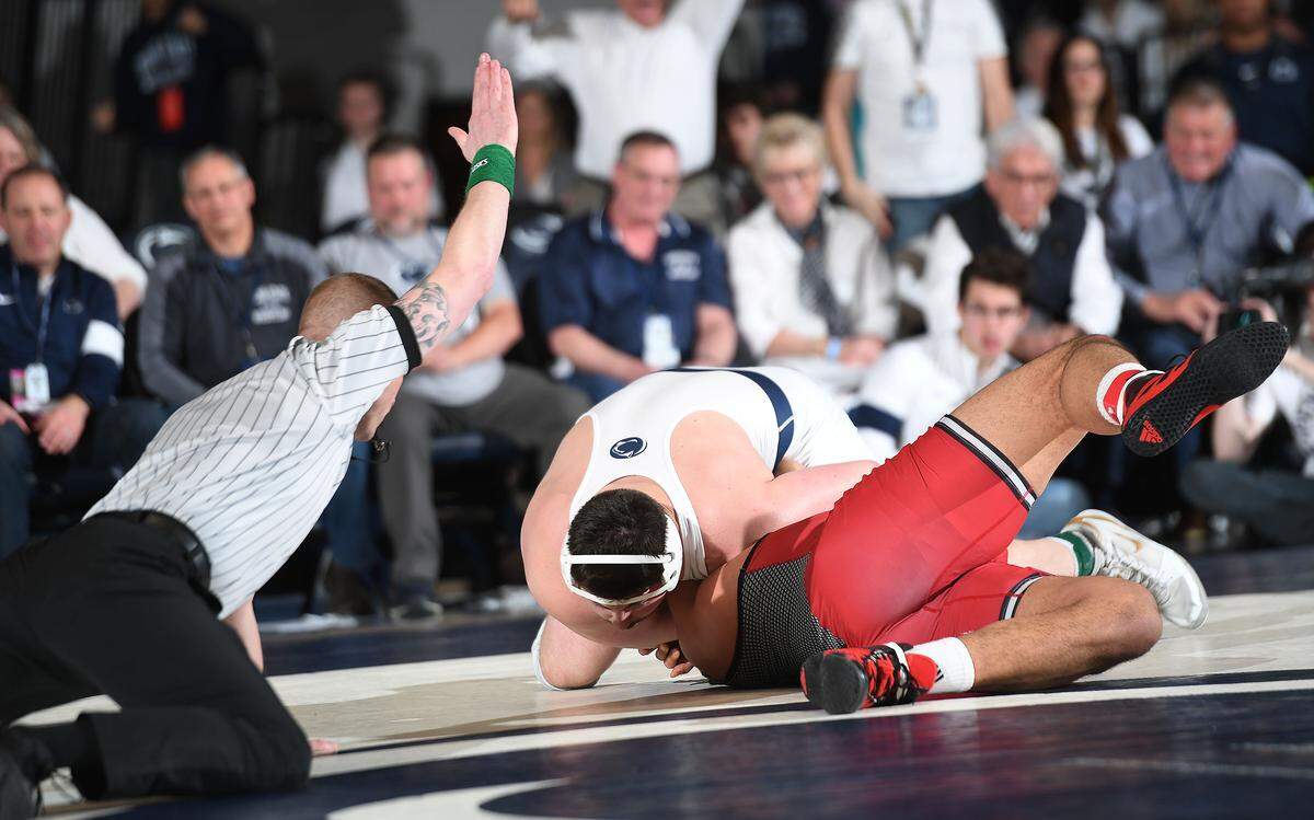 Penn State’s Seth Nevills (top) pins Rutgers Alex Esposito during a Jan. 19, 2020 match at Rec. Hall. Penn State defeated Rutgers 38-6.