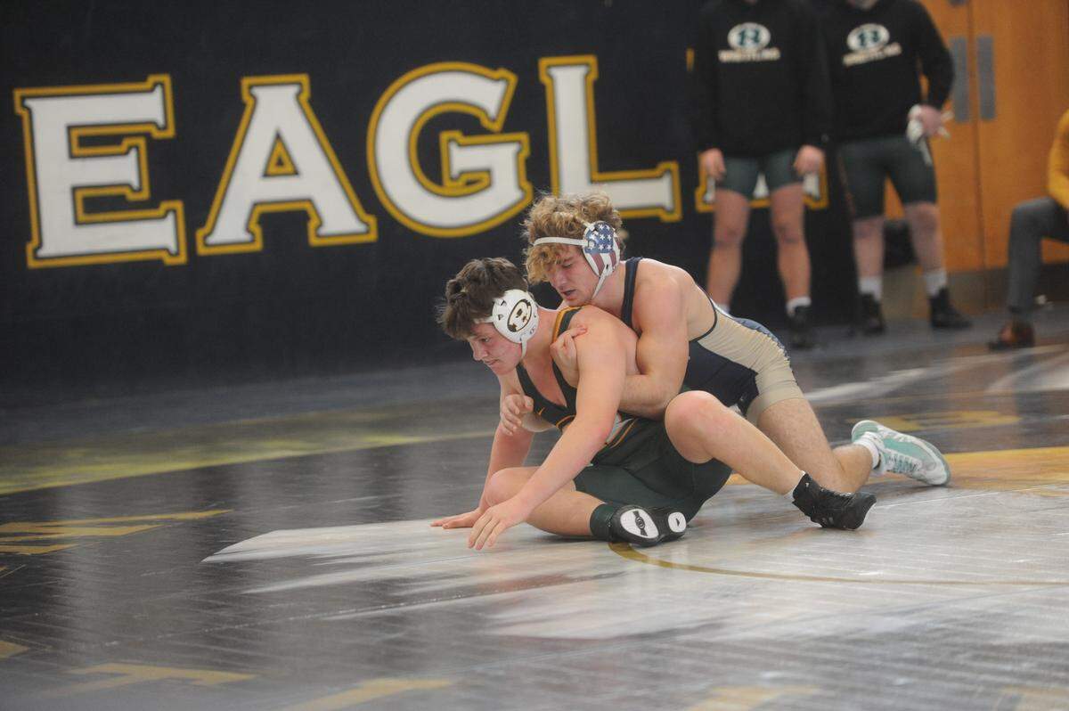 Bald Eagle Area’s Cameron Dubbs attempts to keep Forest Hills’ Kory Marsalko from escaping in their 189-pound bout of the Eagles’ 32-30 loss in the District 6 Class 2A semifinals on Saturday, Feb. 5, 2022. Dubbs used a late takedown to top Marsalko, 7-5.