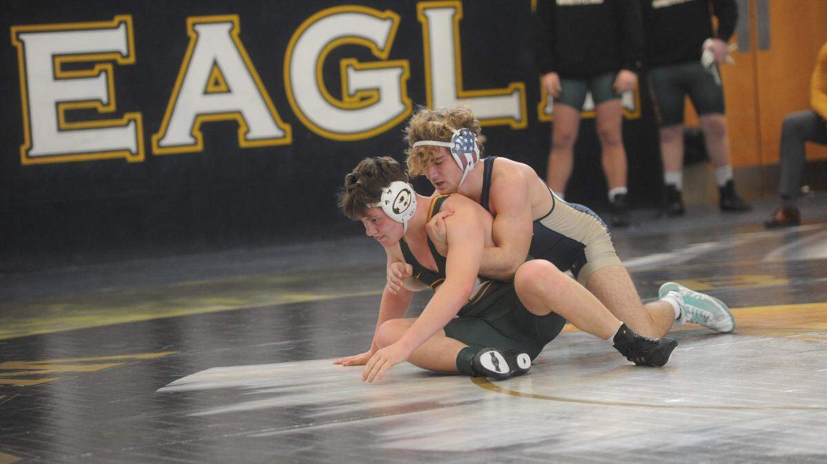 Bald Eagle Area’s Cameron Dubbs attempts to keep Forest Hills’ Kory Marsalko from escaping in their 189-pound bout of the Eagles’ 32-30 loss in the District 6 Class 2A semifinals on Saturday, Feb. 5, 2022. Dubbs used a late takedown to top Marsalko, 7-5.