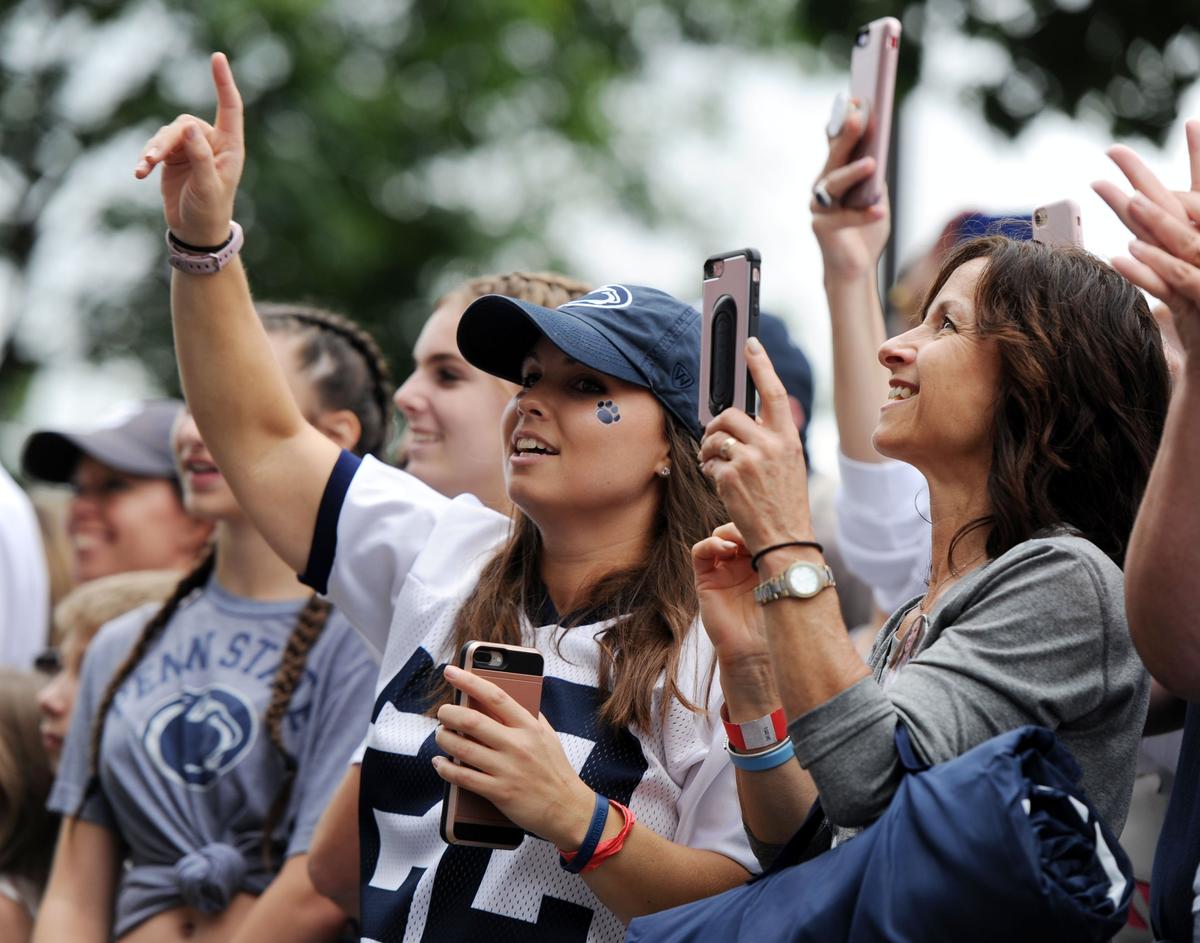 Tina Wyatt cheers during team arrival before the Penn State vs. Kent State game Saturday, Sept. 15, 2018 at Beaver Stadium.
