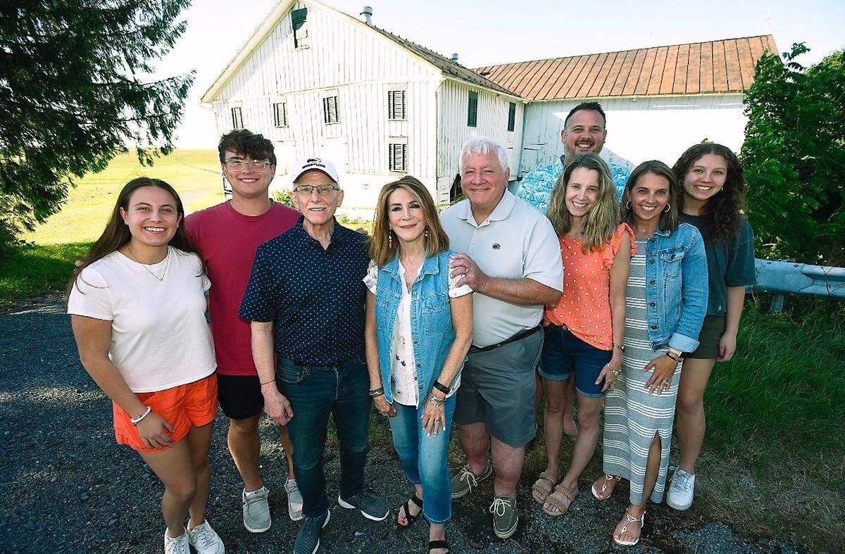 Three generations of the Kepler family pose in front of the Kepler Barn. The barn is at danger of being demolished by the current owner, Penn State, and organizers are trying to raise money to preserve the landmark.