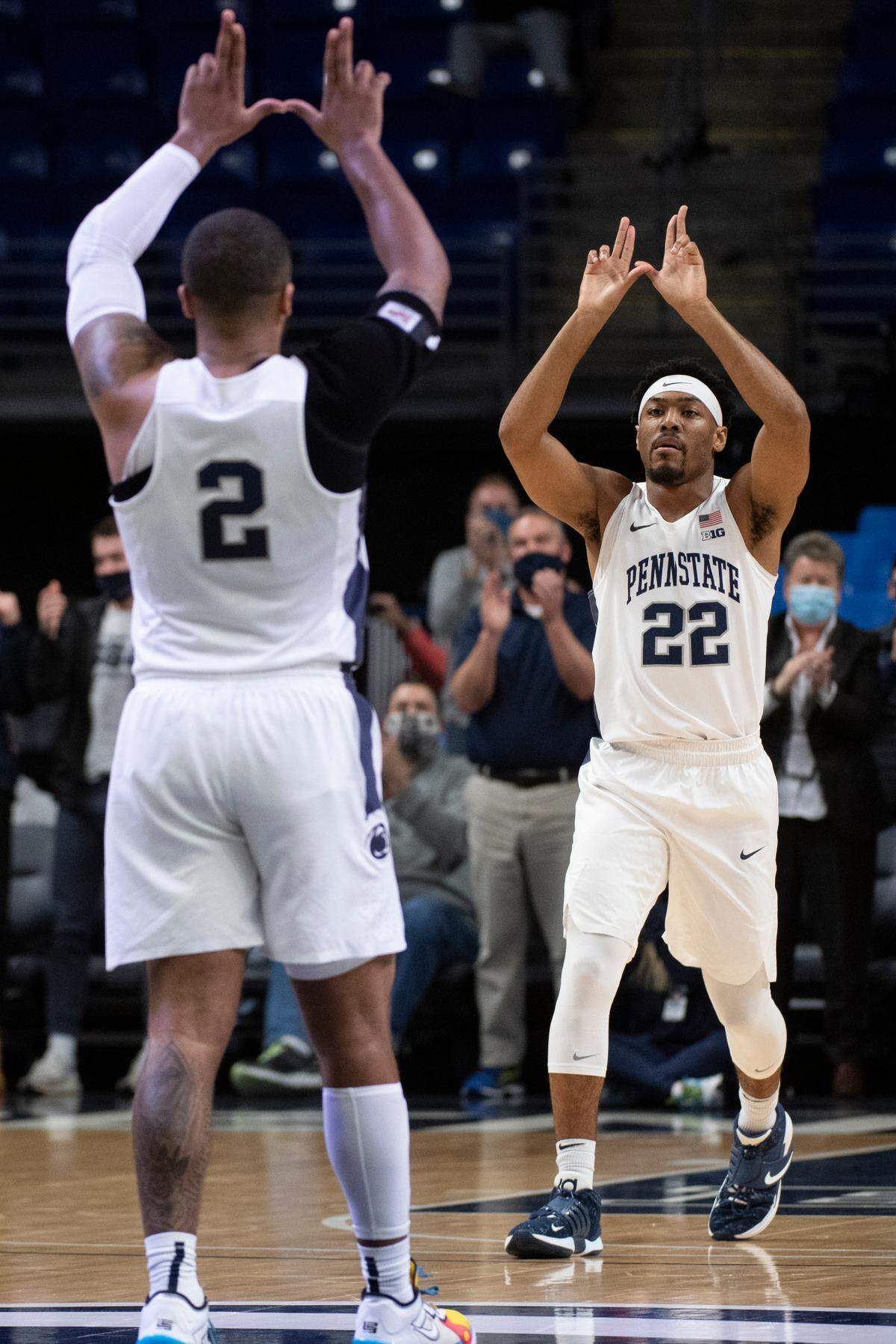Penn State guard Jalen Pickett (22) and Penn State guard Myles Dread (2) celebrate during a game against Minnesota at the Bryce Jordan Center on Feb. 17.