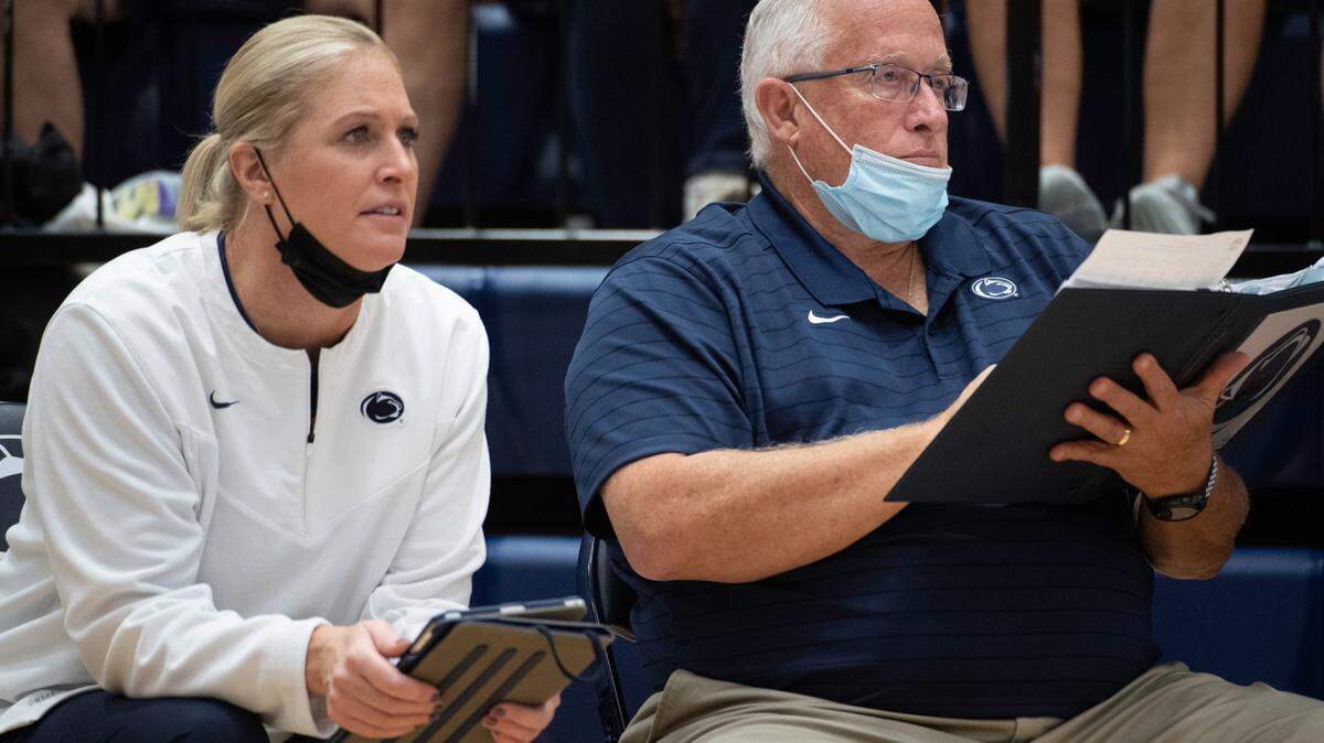 Penn State’s Head Coach Russ Rose and Penn State’s Assistant Coach Katie Schumacher-Cawley look on during an NCAA volleyball match between Penn State and Rutgers at Rec Hall on Friday, Oct. 15, 2021.