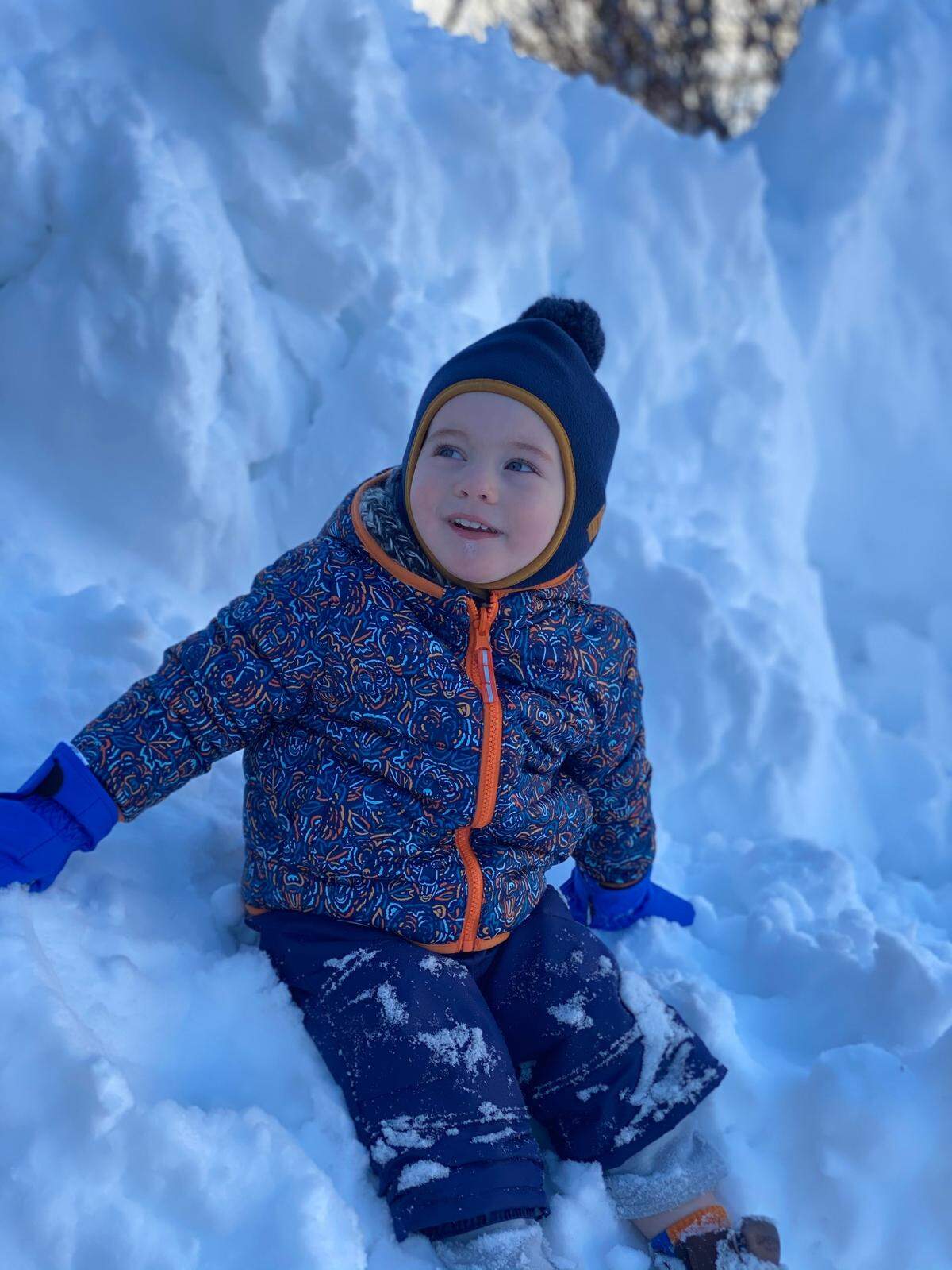 Aidan Alianiello plays in the snow Thursday in Park Forest.