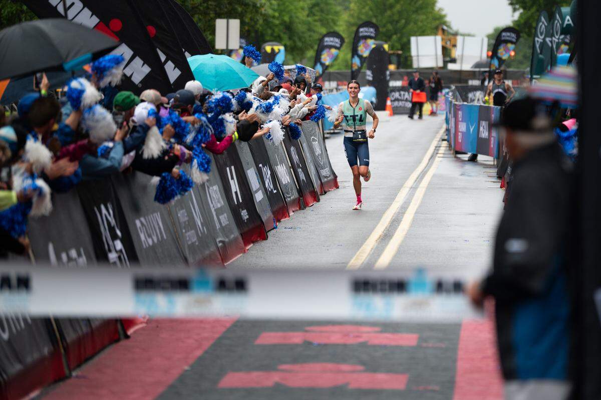 Lydia Russell, first-place finisher overall and in the women’s Pro group races toward the finish line at the Ironman 70.3 Happy Valley on Sunday, June 15, 2025 in University Park, Pa.