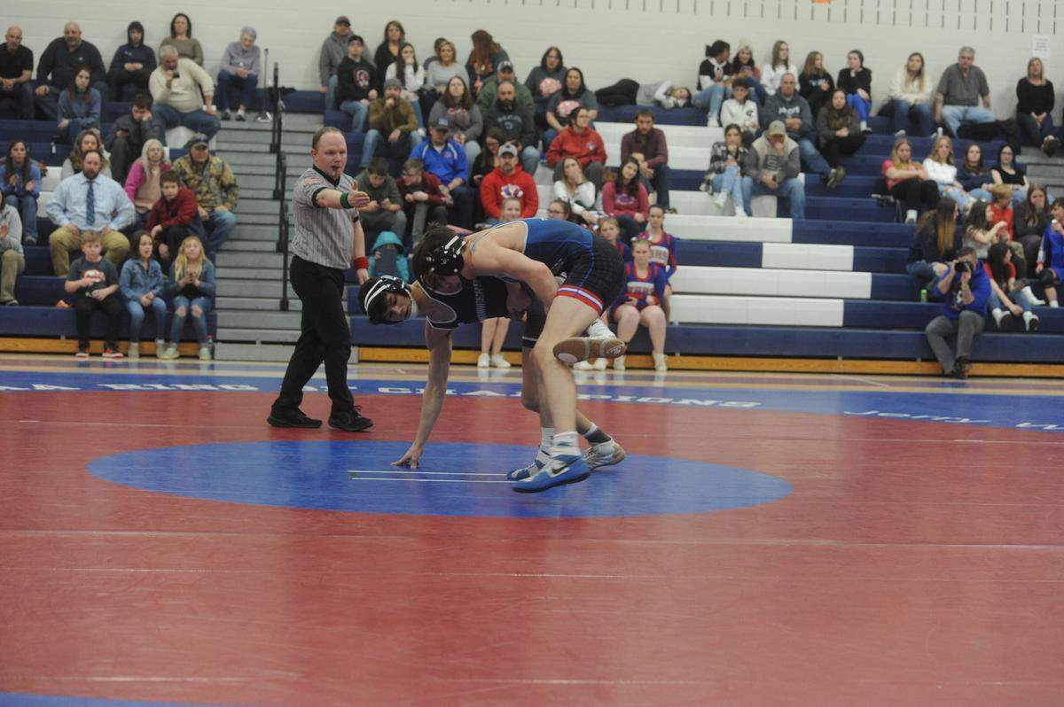 Philpsburg-Osecola’s Austin Foster attempts to keep West Branch’s John Myers from a reversal during their 152-pound bout during the Mounties’ 54-18 win on Feb. 8, 2022. Foster pinned Myers in 3:22.