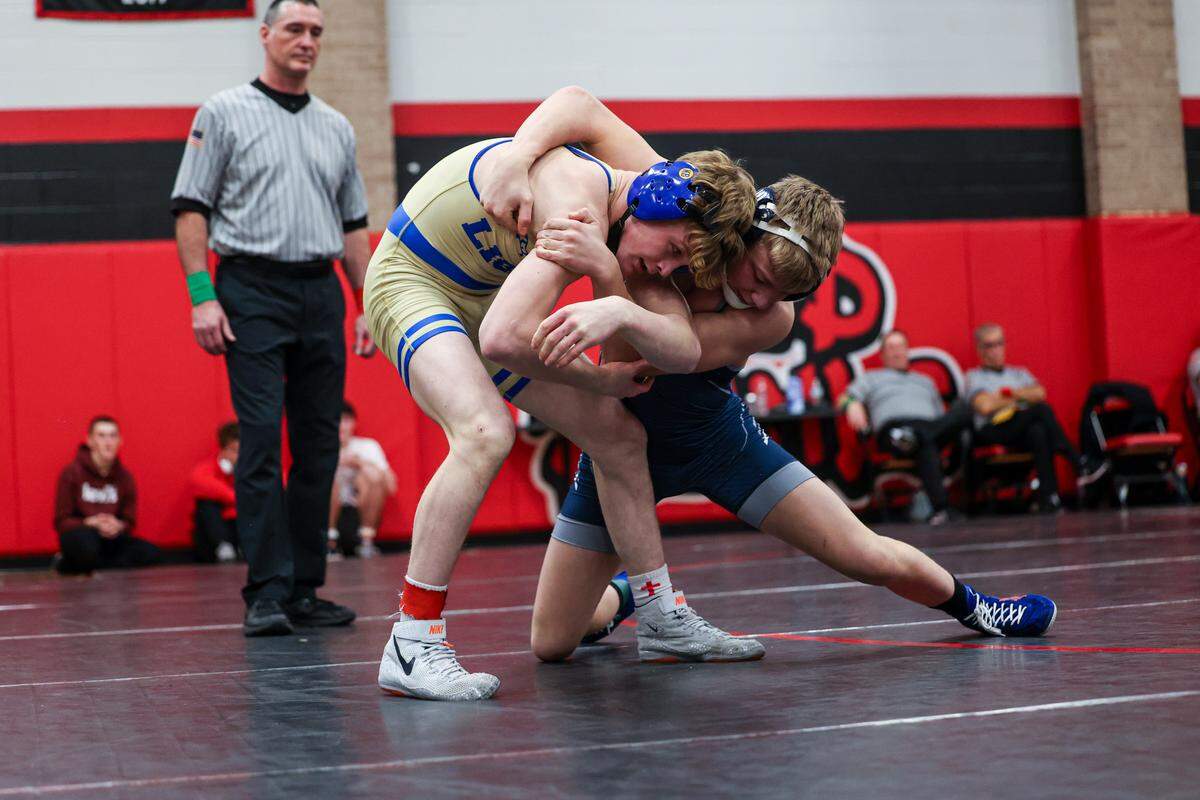 Penns Valley’s Erik Carlile controls Chestnut Ridge’s Dominic Deputy in their 127-pound finals match of the Laurel Highlands Athletic Conference championships on Saturday at Central Cambria High School in Ebensburg. Deputy beat Carlile, 16-1, in 3:54.