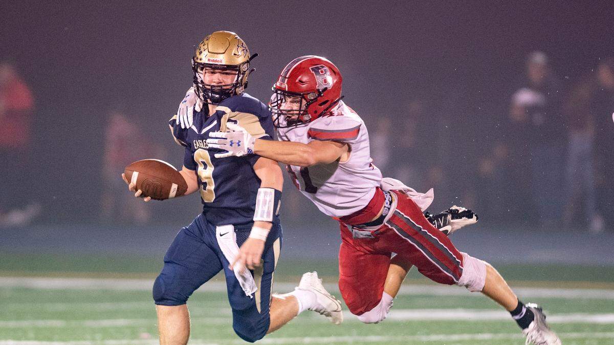 Bellefonte’s Nolan Weaver sacks Bald Eagle Area quarterback Carson Nagle during the Curtin Bowl on Friday, Oct. 15, 2021.