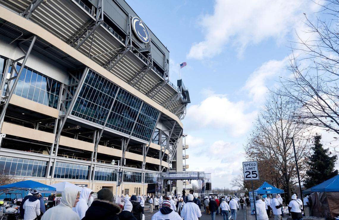 Fans listen to music at the tailgate show outside of Beaver Stadium before the CFP first round game between Penn State and SMU on Saturday, Dec. 21, 2024.