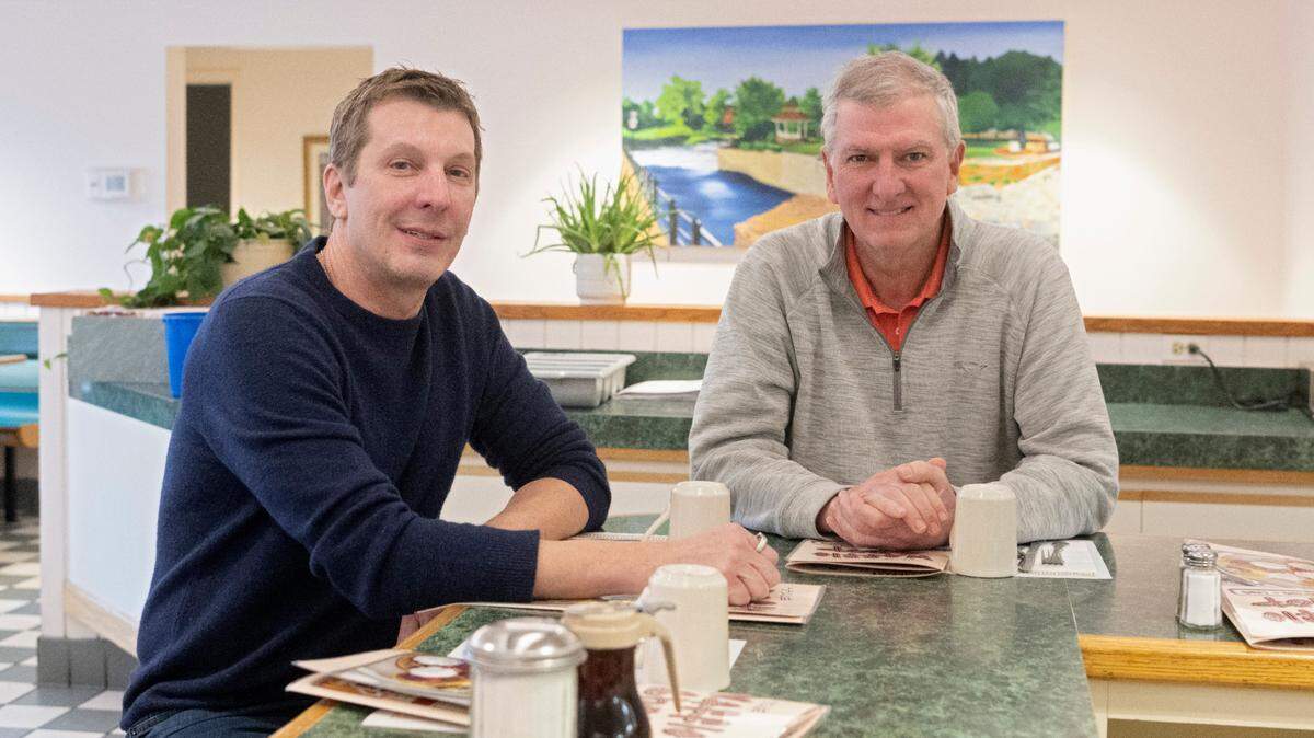 New owner of The Waffle Shop Duane Reese poses Friday with former owner Greg Kight at the Bellefonte location.