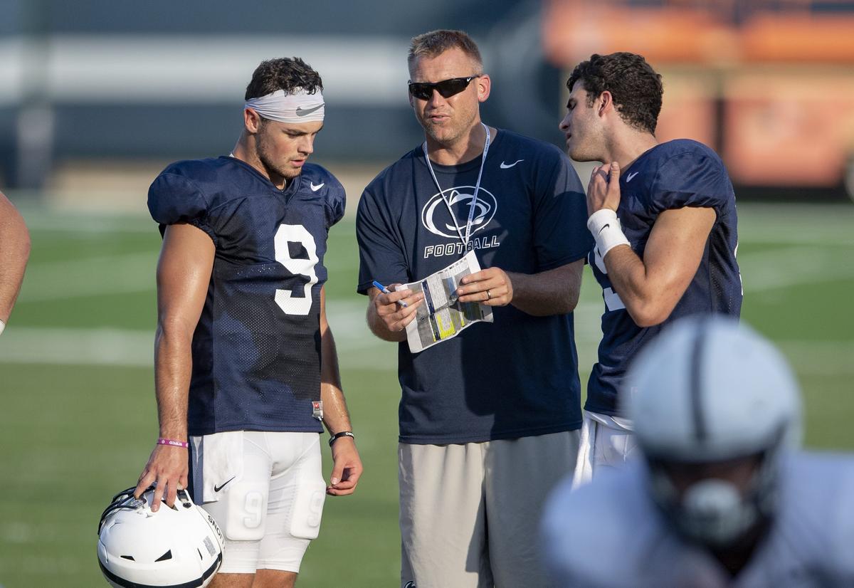 Penn State offensive coordinator Ricky Rahne talks to quarterback Trace McSorley during practice on Wednesday, Aug. 29, 2018.