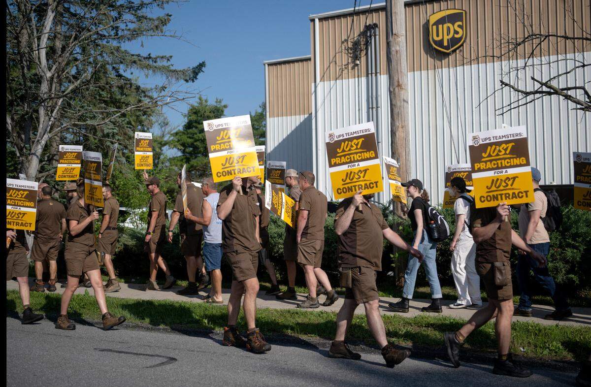 Local UPS workers from the 764 Teamsters union practiced picketing outside the State College UPS Customer Center on Thursday, July 13, 2023.