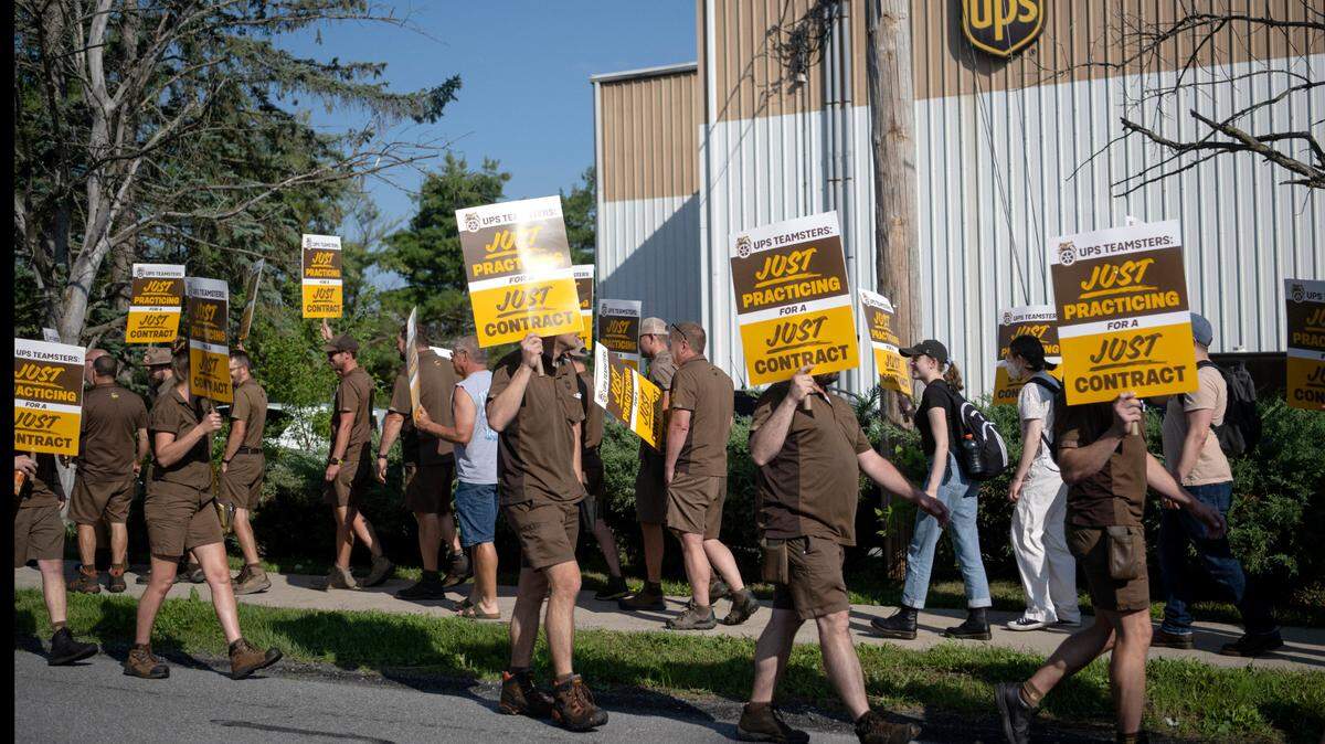 Local UPS workers from the 764 Teamsters union practiced picketing outside the State College UPS Customer Center on Thursday, July 13, 2023.  