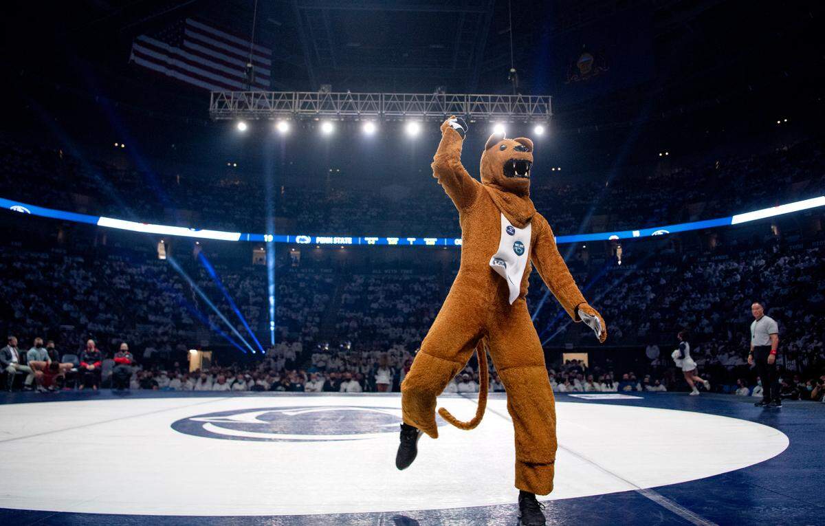 The Penn State Nittany Lion pumps up the crowd during the wrestling match against Ohio State at the Bryce Jordan Center.