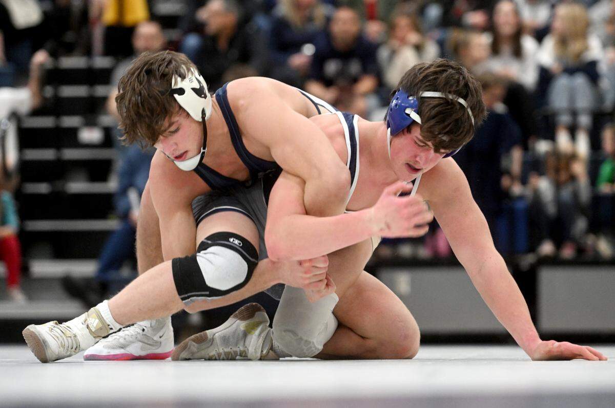 Bald Eagle Area’s Mason Reese and Philipsburg-Osceola’s Ian Phillips wrestle in the 145 lb bout of the match on Wednesday, Dec. 21, 2022.