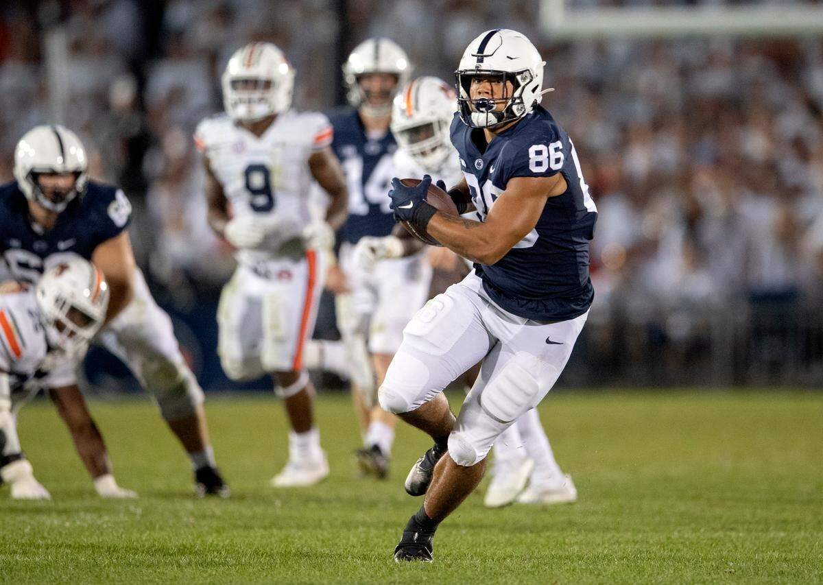 Penn State tight end Brenton Strange makes a catch and runs down the field during the game.