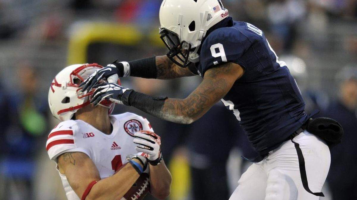 Penn State’s Jordan Lucas stops Nebraska’s Jordan Westerkamp in 2013. This season, Lucas will start in the safety spot.
