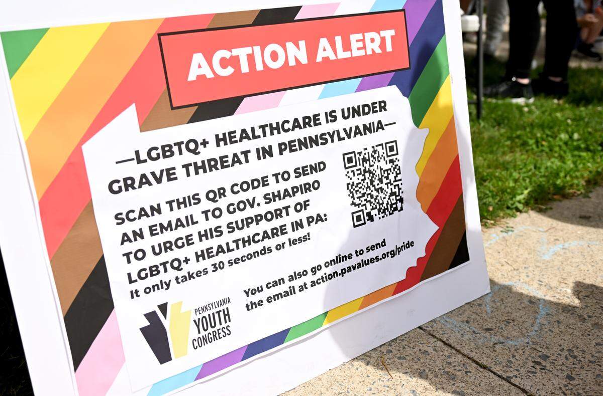 Advocacy signs around State College Pride on Saturday, June 7, 2025.
