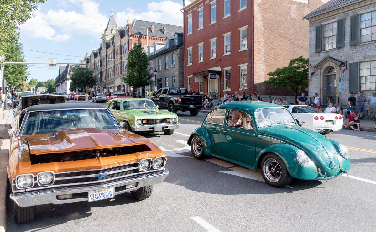 People line Allegheny Street for the Bellefonte Cruise on Friday, June 17, 2022.