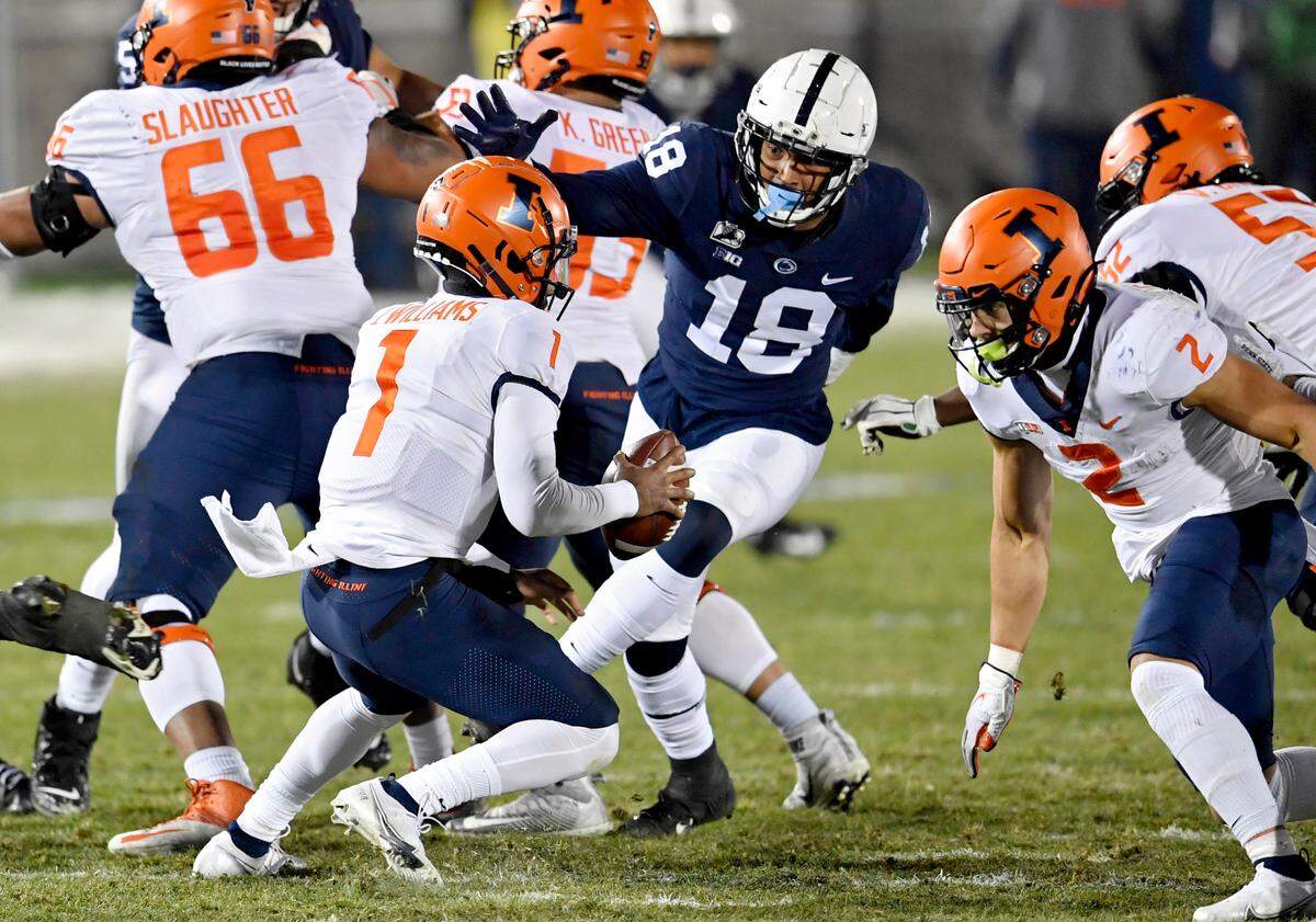 Penn State defensive end Shaka Toney pressures Illinois quarterback Isaiah William during the game on Saturday, Dec. 19, 2020 at Beaver Stadium.