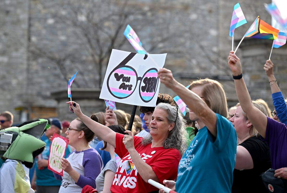 A crowd gathered at the Allen Street Gates for the Transgender Day of Visibility rally hosted by Centre LGBT+ on Tuesday, March 31, 2026.  