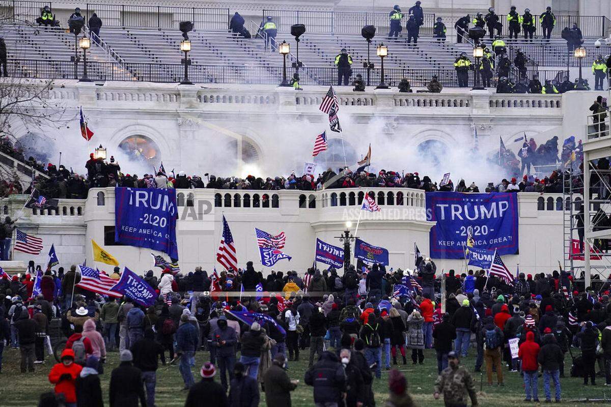 FILE - Violent insurrectionists loyal to President Donald Trump, storm the Capitol, Jan. 6, 2021, in Washington.