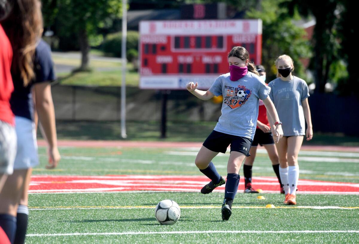 Members of the Bellefonte girls soccer team run a drill during a voluntary practice on Aug. 5, 2020 at Rogers Stadium.