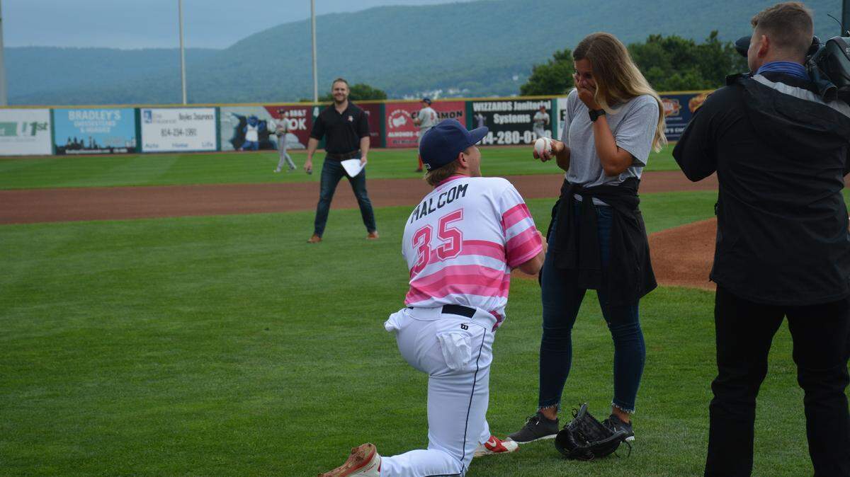 Spikes pitcher Cory Malcom surprised his unsuspecting girlfriend Kayla Turner with his pre-game proposal.