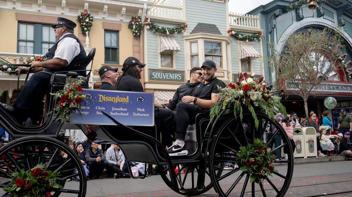 Penn State football players kick off Rose Bowl week at Disneyland