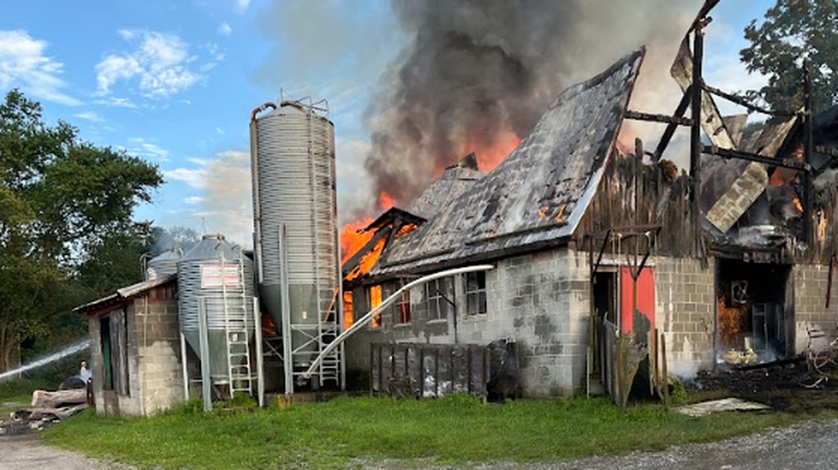 A barn in Miles Township was engulfed in flames Monday morning.