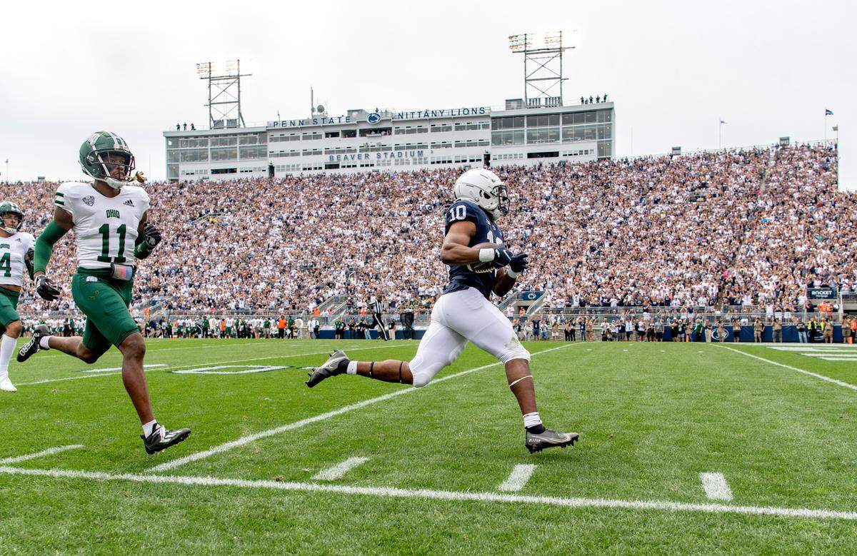 Ohio defenders can’t keep up with Penn State running back Nick Singleton as he runs it in for a touchdown during the game on Saturday, Sept. 10, 2022.