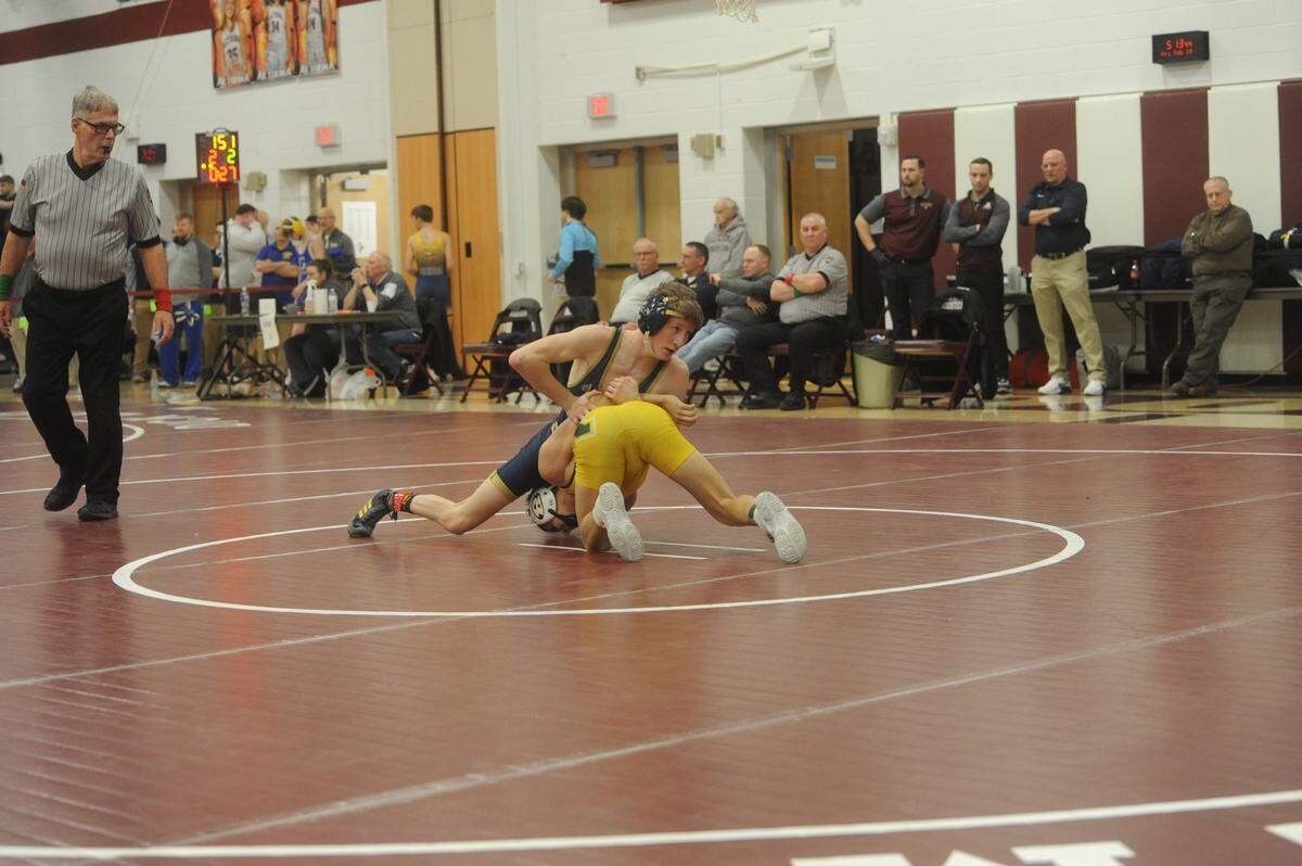 Bald Eagle Area’s Lucas Fye looks to score on Forest Hills’ Brevin Michuk in their 113-pound quarterfinals match of the District 6 Class 2A Championships on Friday, Feb. 18, 2022 in Altoona. Fye pinned Michuk in 3:53.