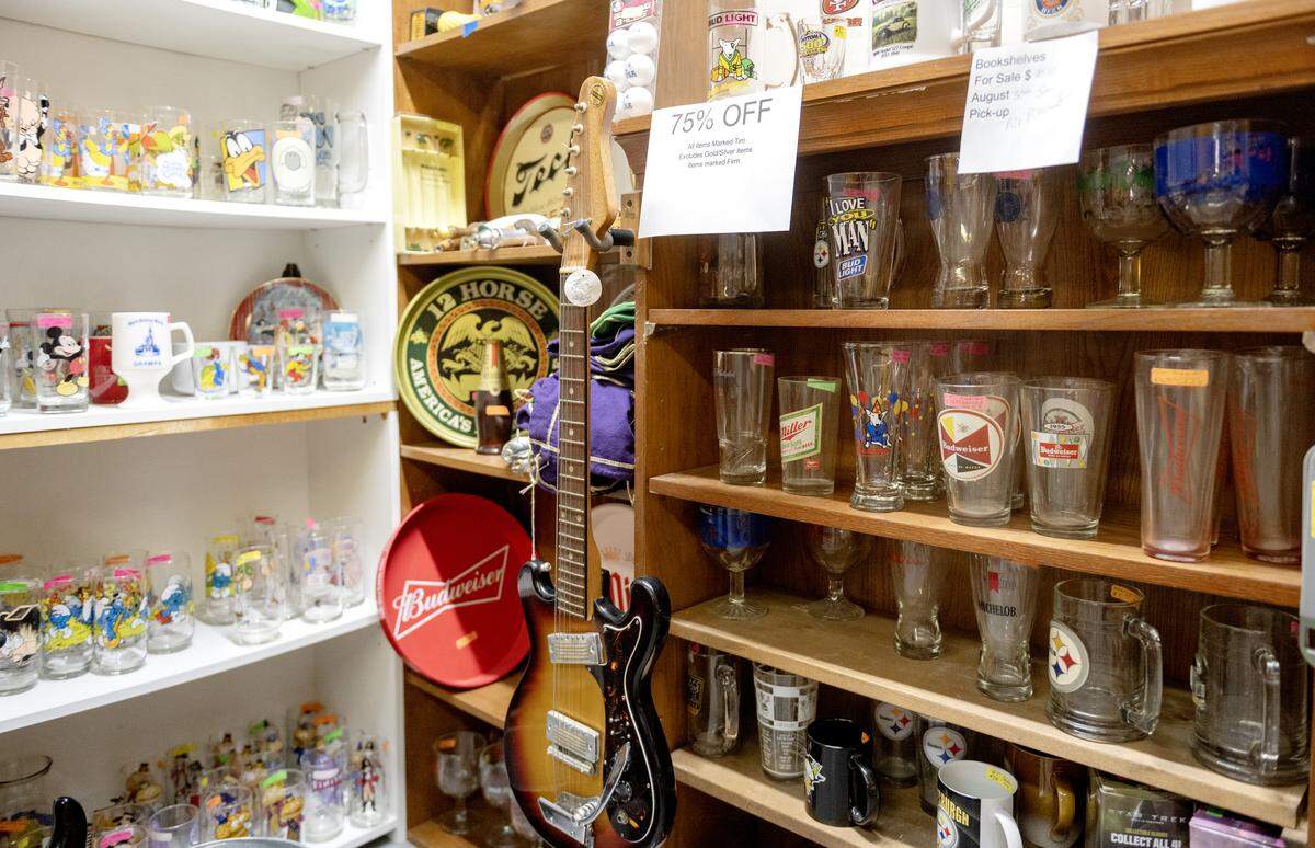 Shelves full of glasses as Unlimited Treasures 2 along the Benner Pike on Thursday, Aug. 28, 2025.  