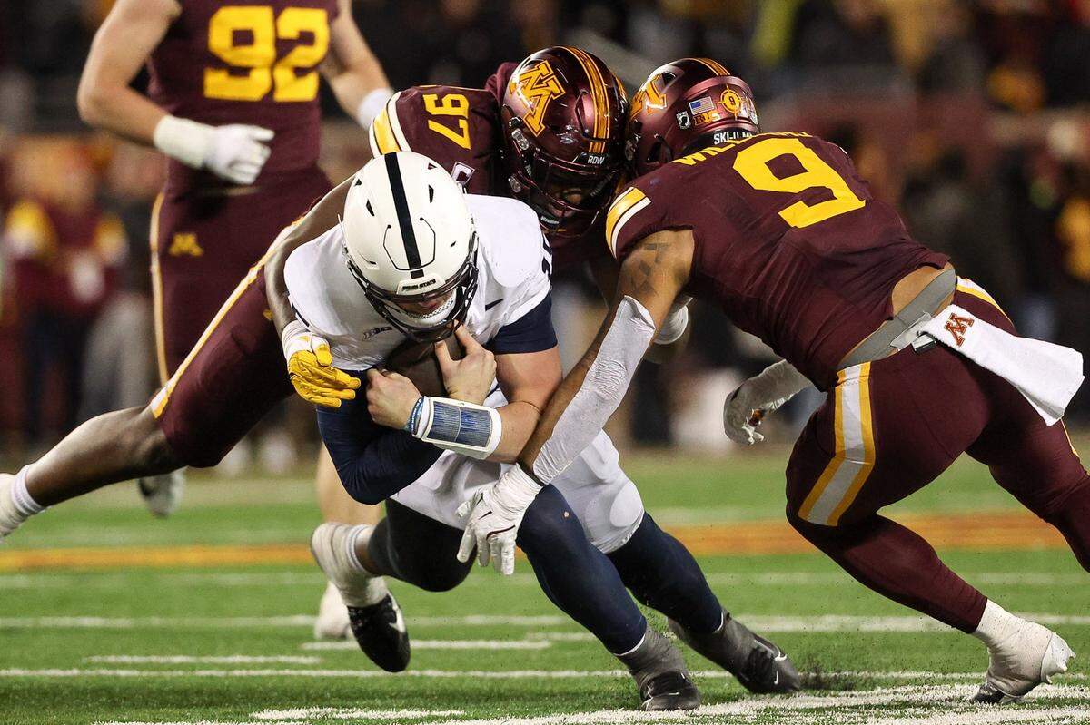 Penn State Nittany Lions quarterback Drew Allar runs the ball against the Minnesota Golden Gophers during the fourth quarter at Huntington Bank Stadium. 