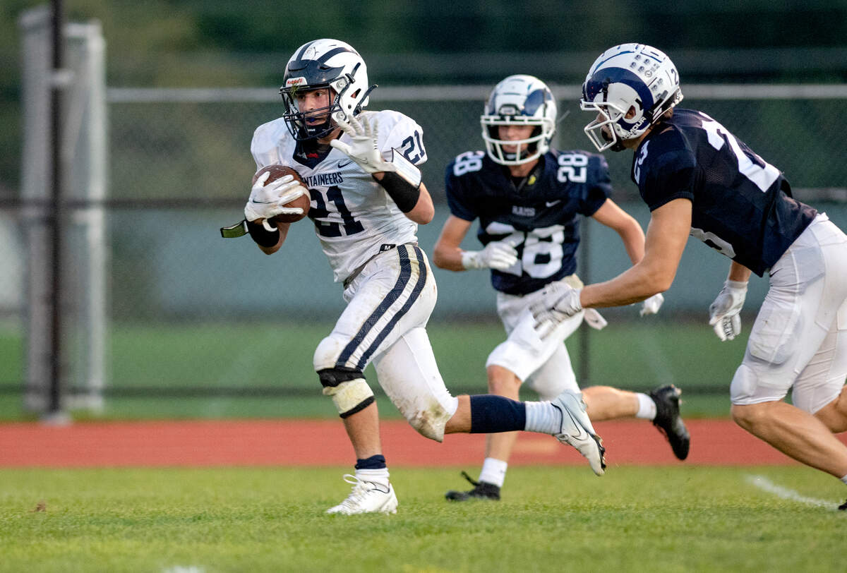 Philipsburg-Osceola’s Matt Martin runs for a touchdown ahead of Penns Valley defenders during the game on Friday, Sept. 17, 2021.