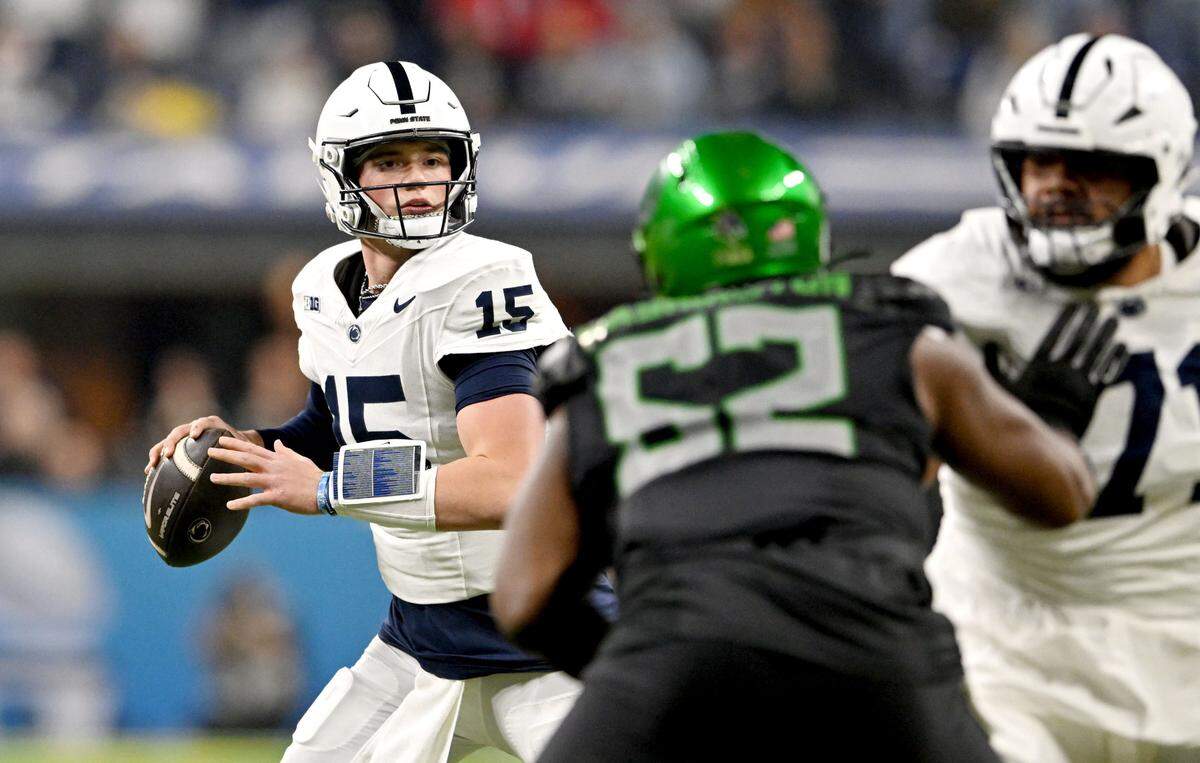 Penn State quarterback Drew Allar looks to pass the ball against Oregon in the first half of the Big Ten Championship game at Lucas Oil Stadium on Saturday, Dec. 7, 2024.