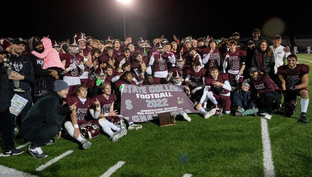 State College Area football celebrates their District 6 6A championship win over Altoona on Thursday, Nov. 10, 2022. State College won, 28-7.