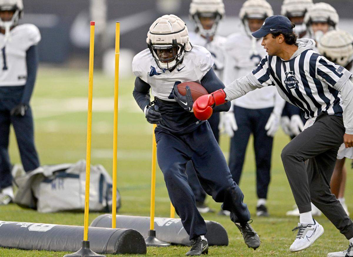 Penn State wide receiver Malick Meiga runs a drill during practice on Wednesday, Nov. 8, 2023.