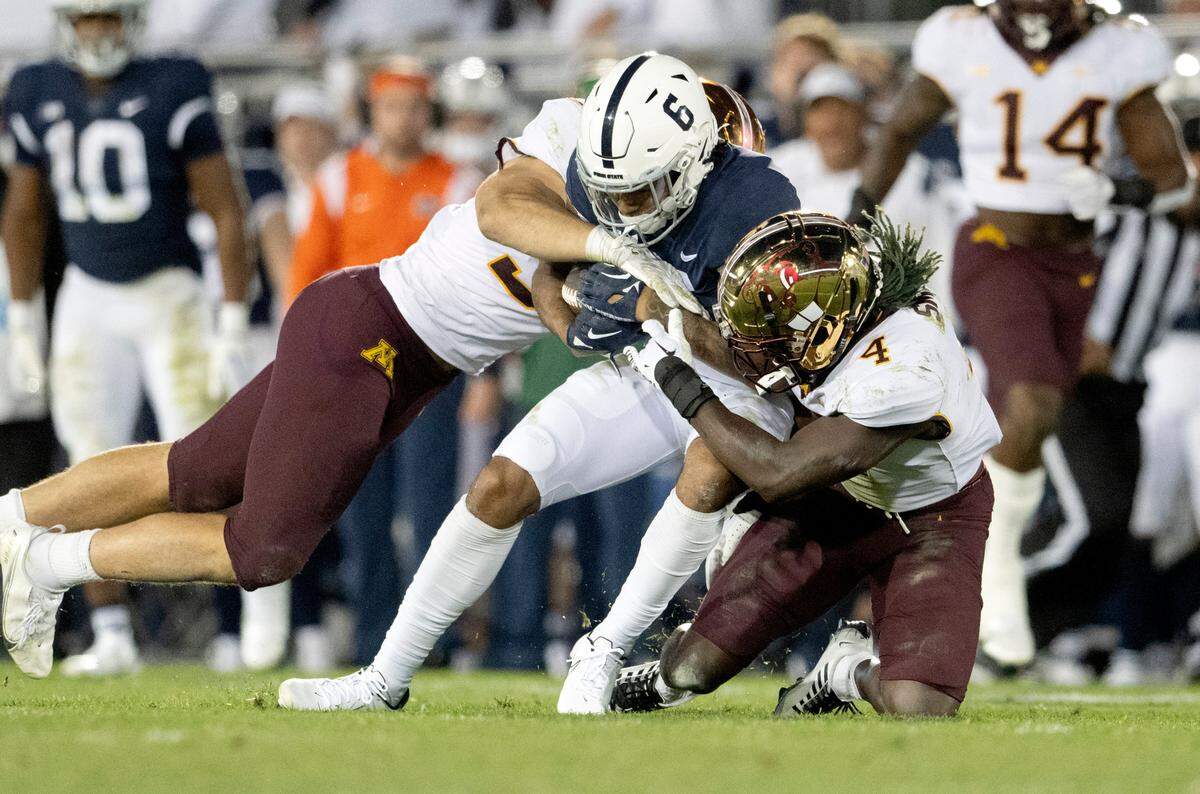 Minnesota defenders stop Penn State wide receiver Harrison Wallace III during the game on Saturday, Oct. 22, 2022.
