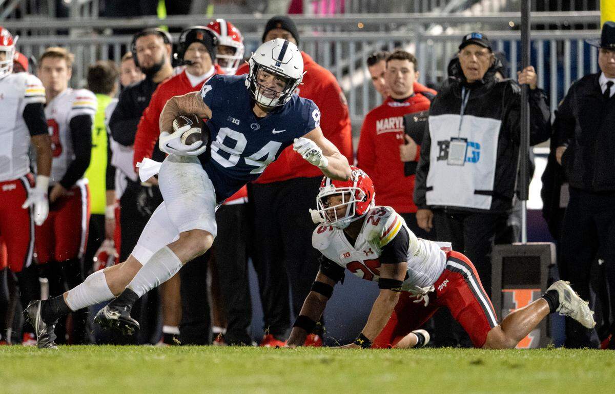 Penn State tight end Theo Johnson makes a catch and cuts around Maryland defenders during the game on Saturday, Nov. 12, 2022.