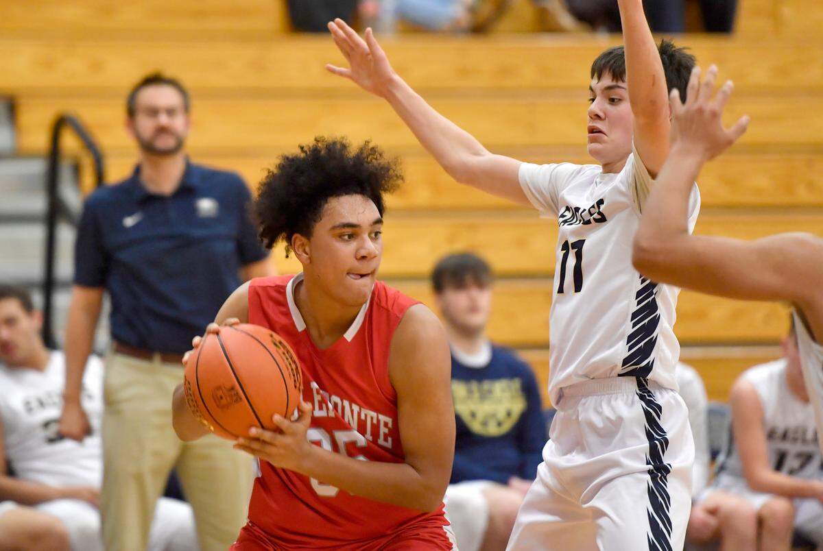 Bellefonte’s Blair Eckley-Jones looks for a teammate to make a pass to around Bald Eagle Area defenders during a Jan. 18 game.