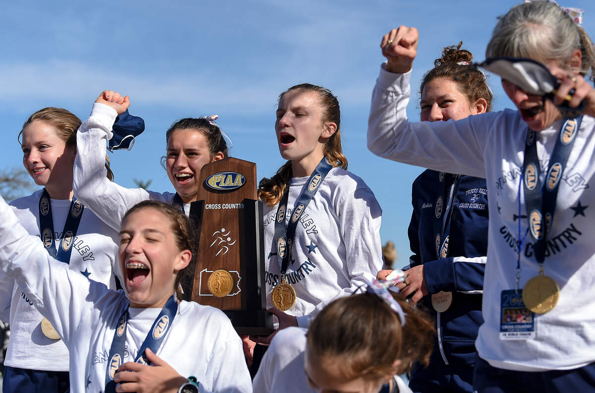 Penns Valley girls celebrate their Class A team title at the PIAA Cross Country Championships on Saturday, November 7, 2020 in Hershey.