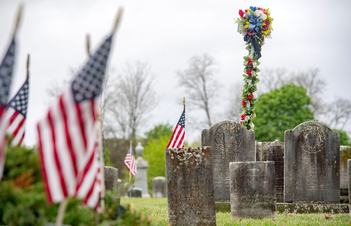 A decorative post highlights the grave of Reuben Hunter at the Boalsburg cemetery on Friday, May 22, 2020.