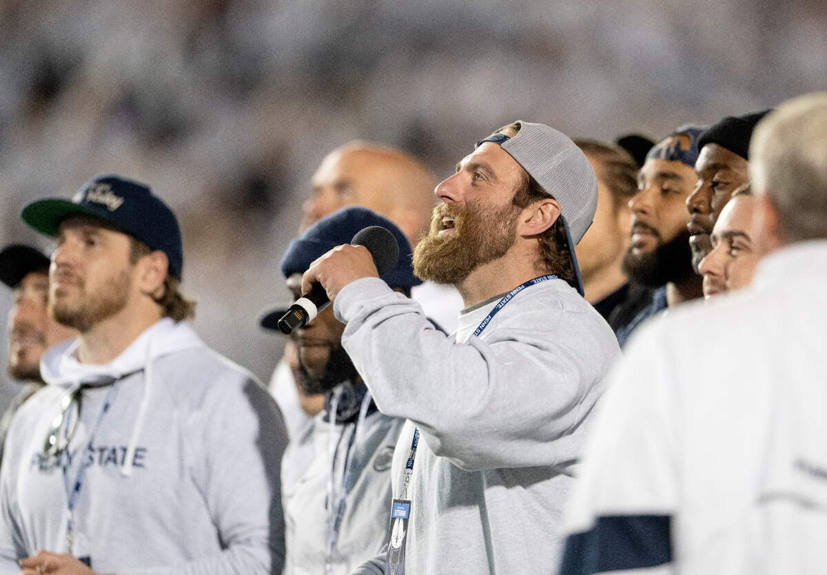 Michael Zordich and fellow teammates from the 2012 Penn State football team lead a “we are” chant during the game against Minnesota on Saturday, Oct. 22, 2022.