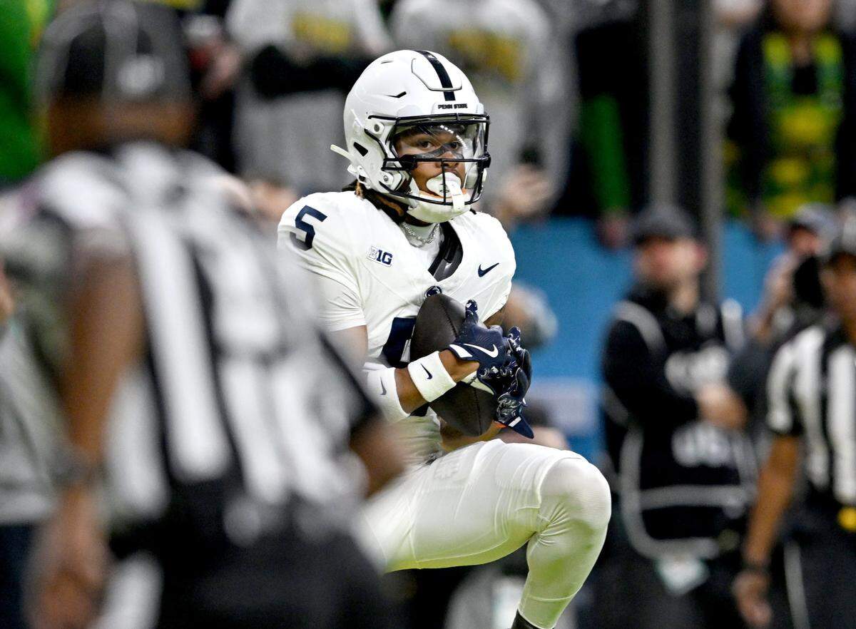 Penn State wide receiver Omari Evans catches a touchdown in the back of the end zone against Oregon in the first half of the Big Ten Championship game at Lucas Oil Stadium on Saturday, Dec. 7, 2024.