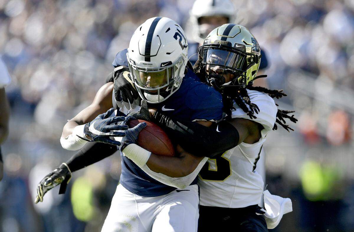 Purdue defenders try to stop Penn State running back Noah Cain during the game on Saturday Oct. 5, 2019.